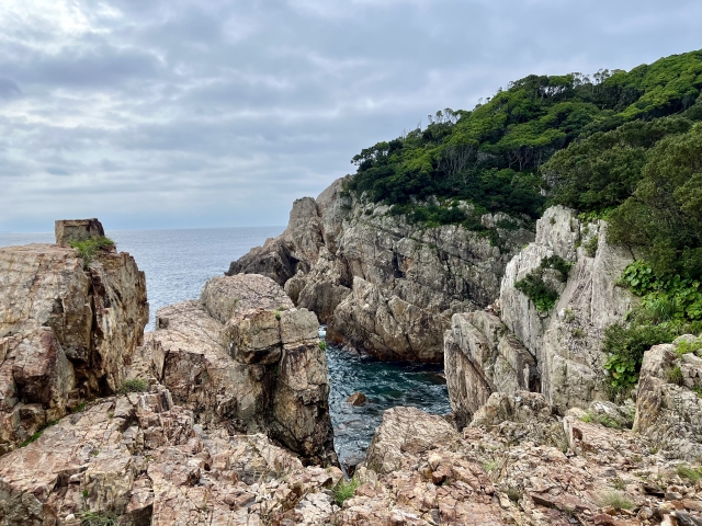 The intricate rocky shores and crystal-clear waters of Crystal Cape